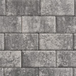 Gray concrete bricks stacked in a structured pattern