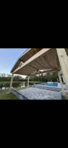 Covered patio with wooden roof structure